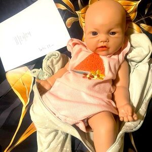 Reborn silicone doll; gently loved. Two dolls available.